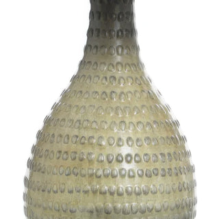 Close-up of distressed French oak finish on textured ceramic lamp base