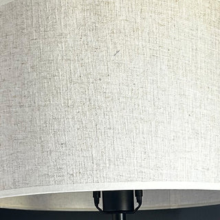 Neutral linen fabric lampshade close-up texture