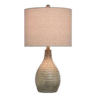 Full view of textured ceramic table lamp with oatmeal shade, rustic farmhouse home décor lighting