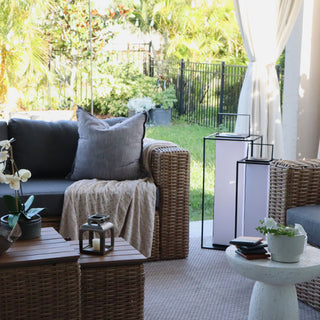 Patio seating area styled with modern solar lanterns