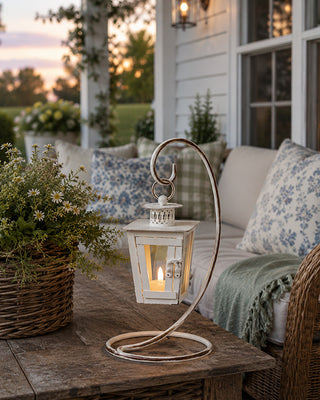 Vintage-Style Distressed White Hanging Lantern with Curved Metal Stand