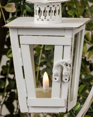 Vintage-Style Distressed White Hanging Lantern with Curved Metal Stand