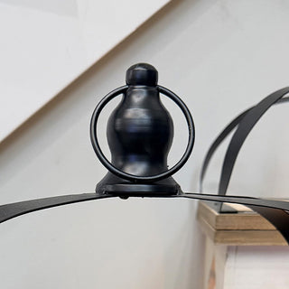 Black metal lantern handle close-up detail