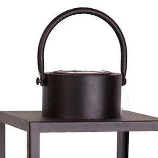 Handle and top view of black metal LED lantern