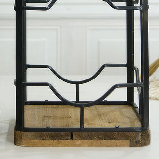 Bottom view showing natural wood base with metal frame attachment on decorative glass lantern