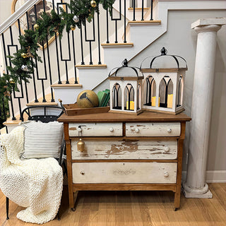 Decorative lantern set displayed on console table