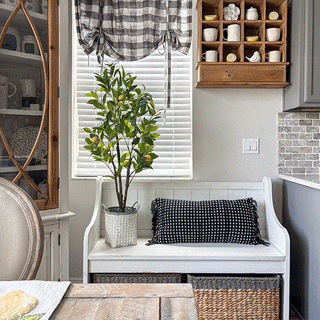 Faux lemon tree styled on farmhouse kitchen bench