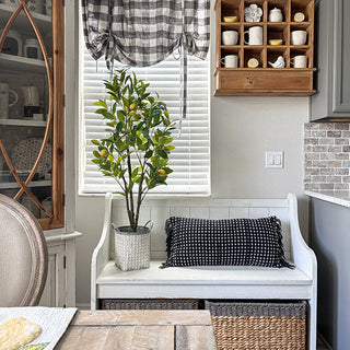 Artificial lemon tree accent in farmhouse kitchen