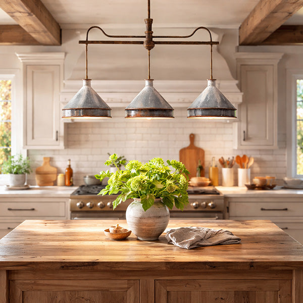 Rustic farmhouse kitchen island with industrial pendant lighting