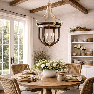 Rustic farmhouse chandelier over round dining table