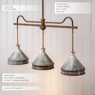 Industrial farmhouse triple pendant light over dining table