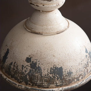 Close-up distressed metal pendant shade vintage finish