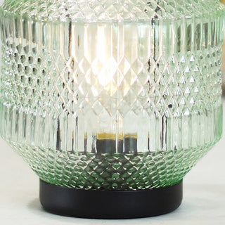 Green hobnail textured glass lantern detail showing diamond pattern