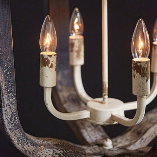 Candle style bulbs rustic chandelier detail closeup