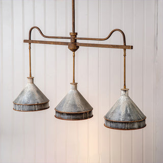 Vintage metal three-light pendant fixture rustic industrial style
