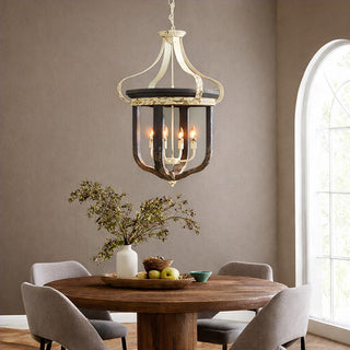 Farmhouse dining room chandelier over wooden table