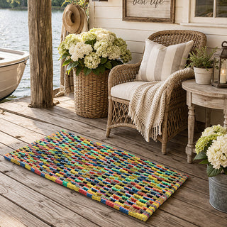  Multicolor recycled flip flop mat runner on lakeside porch with wicker furniture