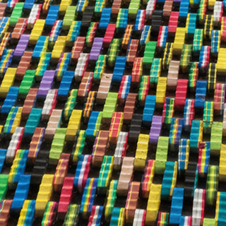  Detail view of multicolor sustainable rug made from flip flop scraps
