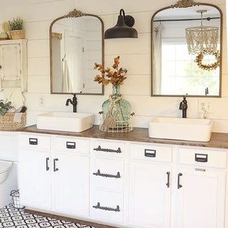 Antique gold mirror gallery wall with candle sconces