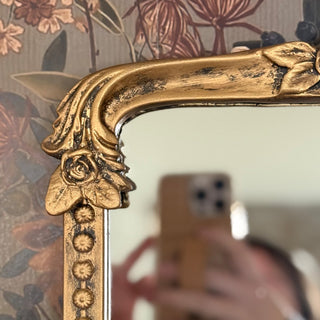 Distressed antique gold mirror corner frame detail