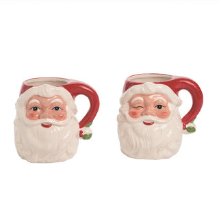  Front view of two Santa mugs side by side showing different playful expressions set of 2 dolomite Christmas mugs
