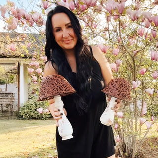 Iron mushroom decor set displayed in spring garden