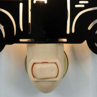 Push button switch on farmhouse-style night light