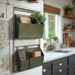 Industrial metal wall organizer with storage bins and hanging rail in bronze finish