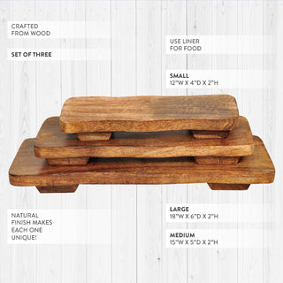 Stacked wooden pedestal risers showing graduated sizes with dimensions labeled