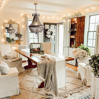 Farmhouse dining room with wood bead chandelier lighting