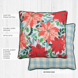 Double-sided reversible Christmas pillow showing coral poinsettia floral front and blue buffalo check gingham back with dark teal piping