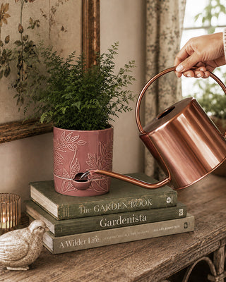 Red ceramic self watering planter botanical rose finish