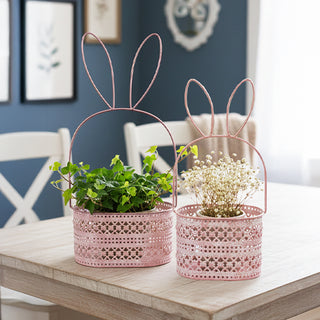 Pink bunny metal baskets with plants table decor