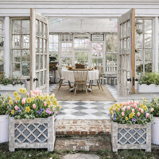 Rustic farmhouse greenhouse dining room with planters