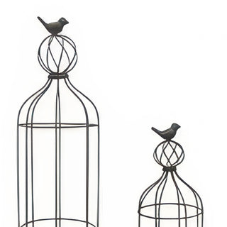 Close-up of decorative bird finial on open wirework orb topper detail
Dark bronze metal planter pots at base of bird cage trellis set