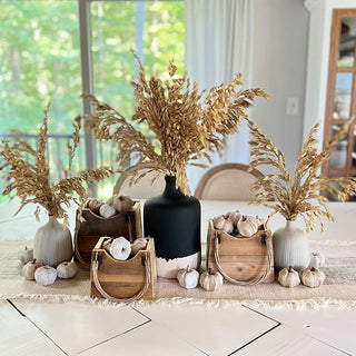Neutral fall table décor featuring rustic wooden tote planters
