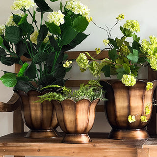 Set of bronze floral planters for home decor