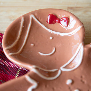 Close-up of ceramic gingerbread girl face detail