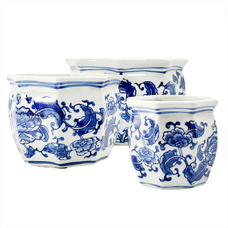 Close-up of scalloped rim blue and white ceramic planter detail