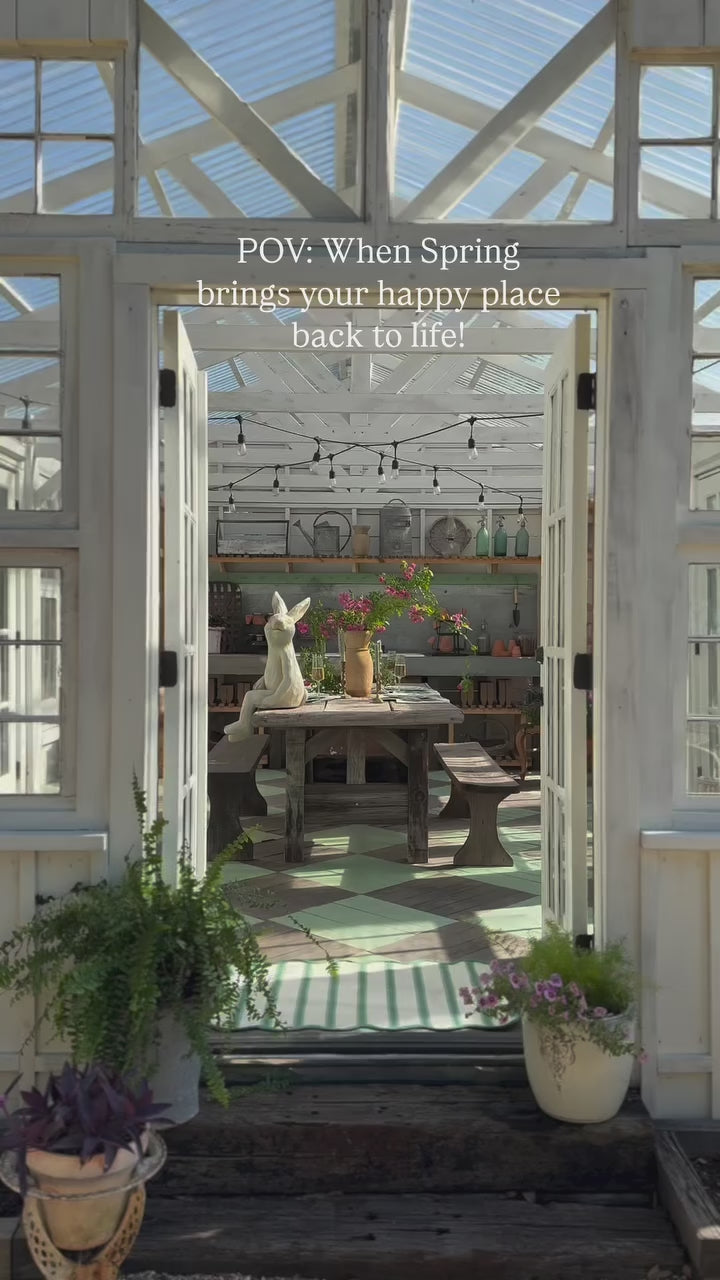 rabbit statue in garden greenhouse shed