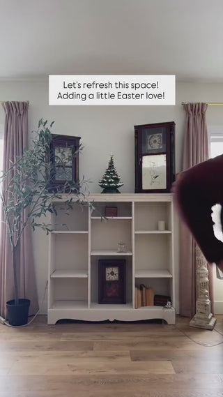 rattan trunks next to fireplace mantel