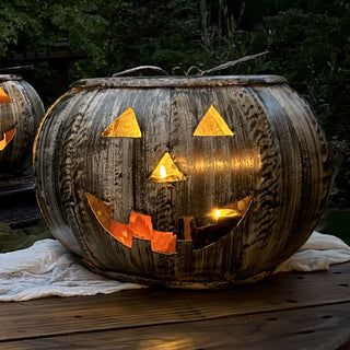 Close-up of rustic metal jack-o'-lantern