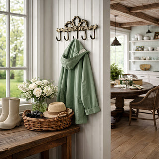 Farmhouse cast iron wall hooks in entryway decor