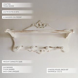 French country white wood wall rack with carved crown detail and towel bar