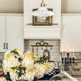 Rustic farmhouse kitchen wall hooks styled decor scene