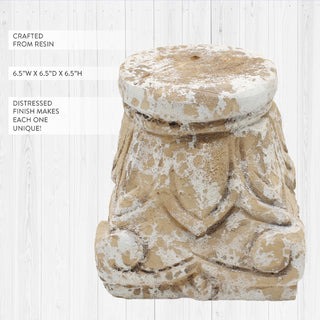 Distressed resin pedestal showing detailed acanthus leaf molding and aged finish