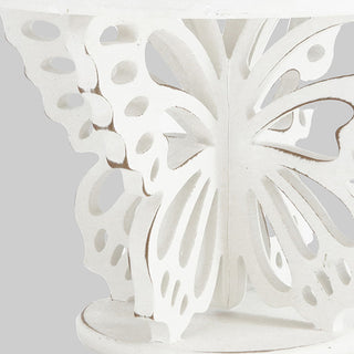 Closeup hand carved butterfly wing cutout detail white distressed finish
