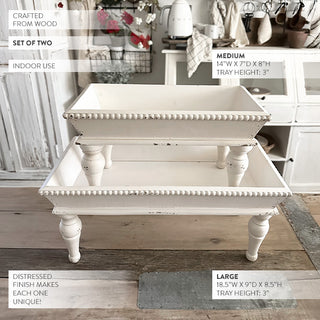 Rustic white riser trays styled with farmhouse decor