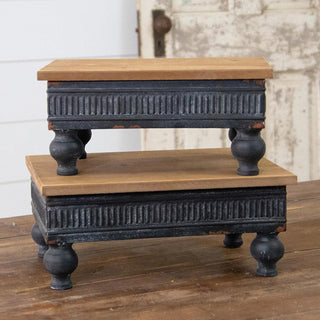 Stacked comparison of medium and large farmhouse risers showing size difference and matching distressed finish
