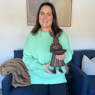 Woman holding Female Royal Hare statue showing scale and size 16 inch tall resin figurine home decor